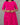 Person wearing a bright pink dress with subtle patterns on a gray background