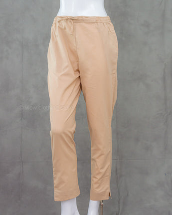 Beige cotton bottom on a mannequin against a gray background