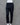 Black pants on a mannequin against a gray background