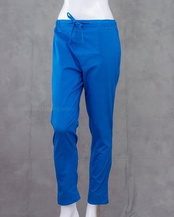 Blue pants on a mannequin against a gray background