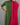 Green kurta with red heart patterns and a pink dupatta draped over one shoulder against a gray background.