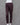 Deep brown cotton pants on a mannequin against a gray background