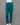 Deep green pants on a mannequin against a gray background
