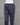 Grey kurti pants on a mannequin against a gray background