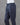 Grey pants on a mannequin against a gray background
