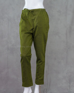 Olive green cotton bottom on a mannequin against a gray background