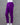 Purple pants on a mannequin against a gray background
