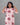 Woman wearing a red and white patterned dress against a gray background