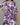 Woman wearing a purple and white patterned kurti set against a gray background