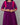 Purple dress with pink straps on a gray background