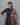 Model wearing women's butta black semil-silk 3pc kurti set with dupatta