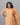 Model wearing women's floral rustic orange semil-silk 3pc kurti set with dupatta