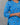 Blue patterned dress worn by a person on a gray background
