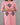 Pink kurta with black geometric patterns on a gray background
