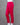 Bright pink pants on a mannequin against a gray background