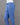 Denim blue cotton bottom on a mannequin against a gray background
