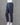Grey bottoms on a mannequin against a gray background