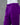 Purple pants on a mannequin against a gray background