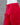 Red pants with a drawstring waist on a mannequin against a gray background.