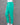 Green pants on a mannequin against a gray background