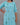 Light blue kurti with floral patterns on a gray background