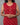 A women wearing tie and dye red color cotton kurti on a grey background