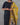 Close-up of butta on women's black cotton kurti set