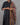 Close-up of butta on women's black semil-silk 3pc kurti set with dupatta
