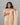 Model wearing women's floral beige semil-tissue 3pc kurti set with dupatta