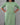 Close-up of plain on women's green cotton 2pc kurti set